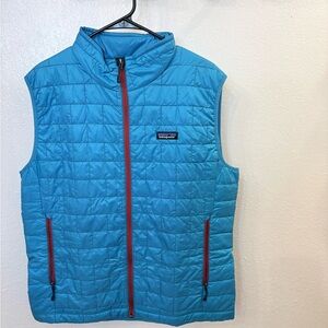 Patagonia Aqua Blue Quilted Vest with Black Logo Patch